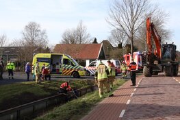 Scootmobiel te water in Kwadijk